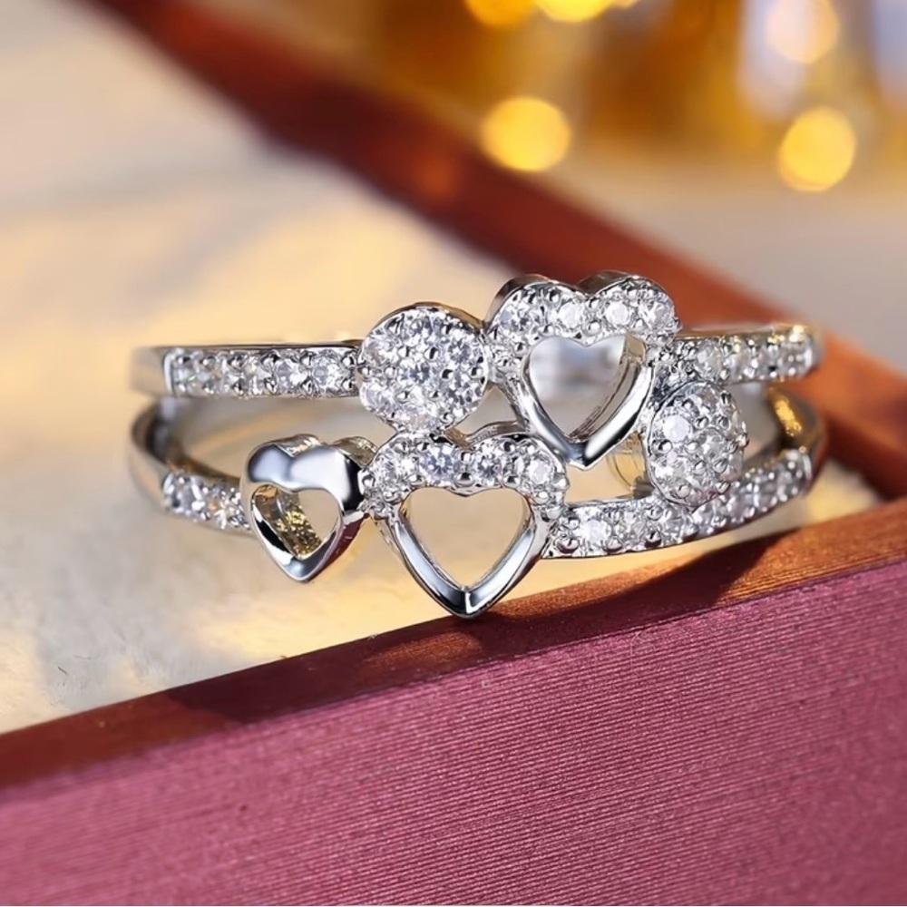 Silver Heart Ring with Sparkling Stones.